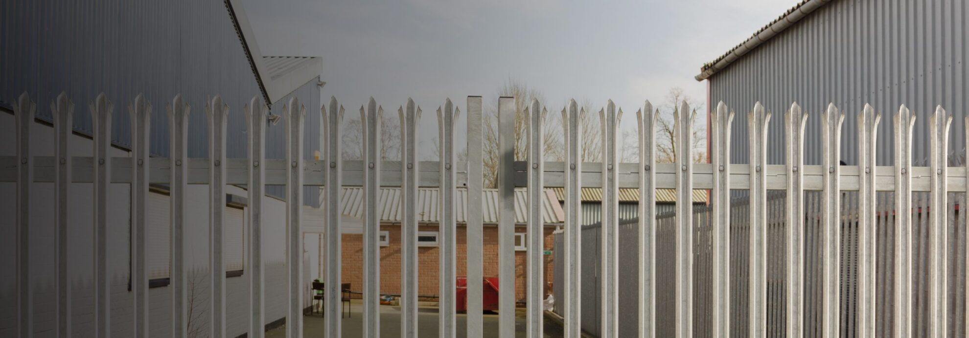 Set of locked spiked security gates at an industrial or commercial premises in greeley co
